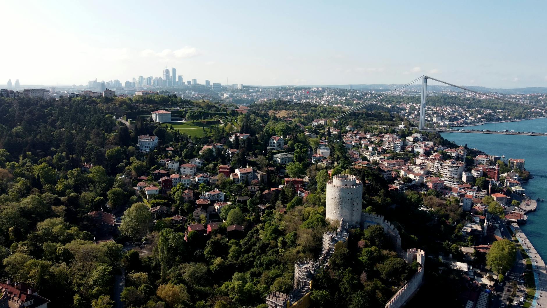 Aerial perspective of the steep hills and residential houses near Rumeli Hisarı fortress.