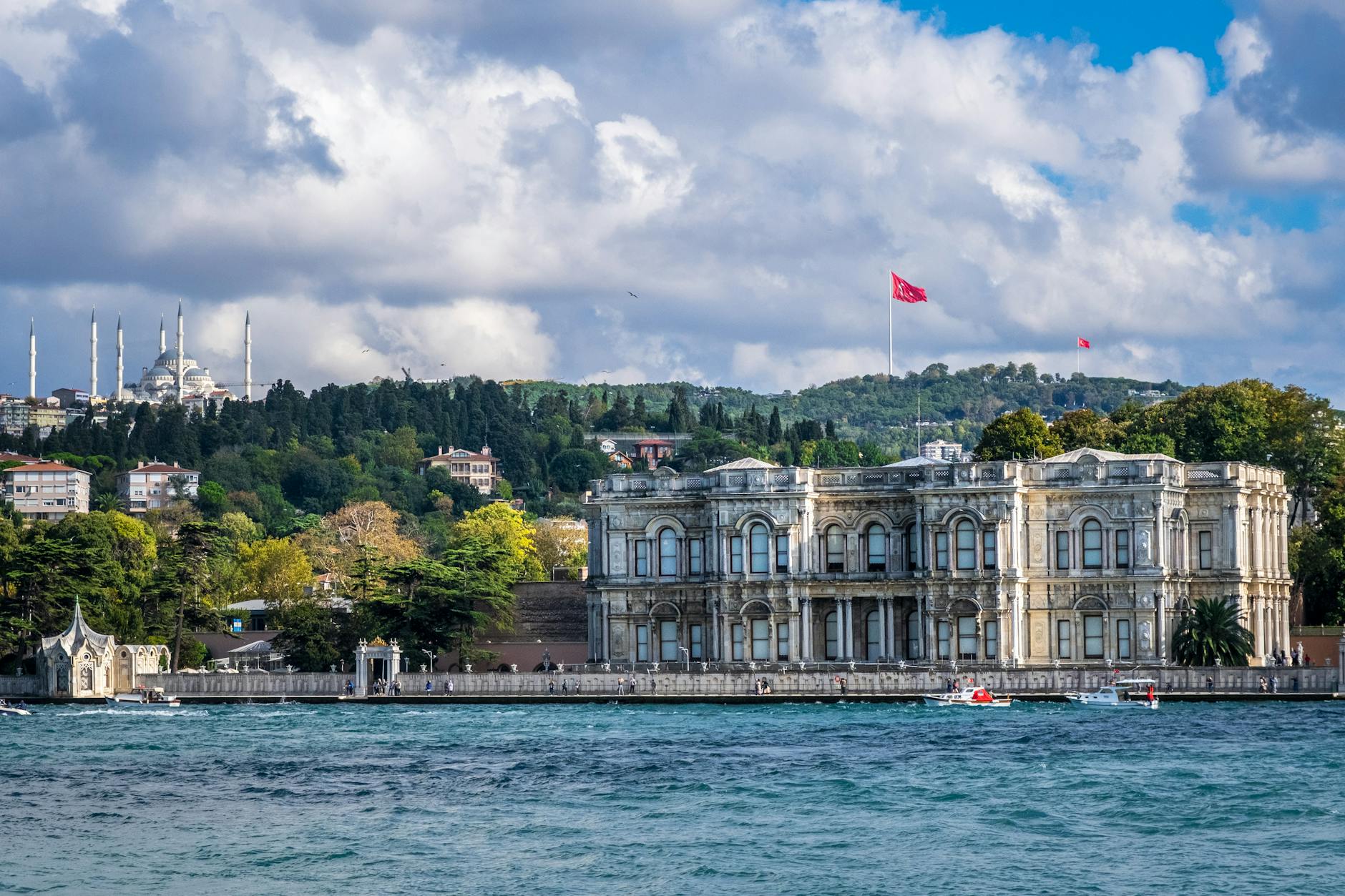 Beylerbeyi Palace sits on the waterfront with the distant Camlica Mosque on the hill.