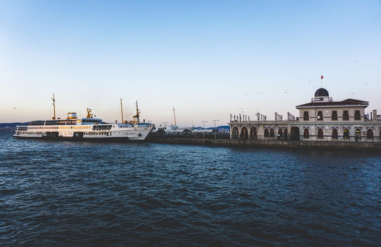 Traditional passenger ferry moored at the historic Buyukada ferry terminal.