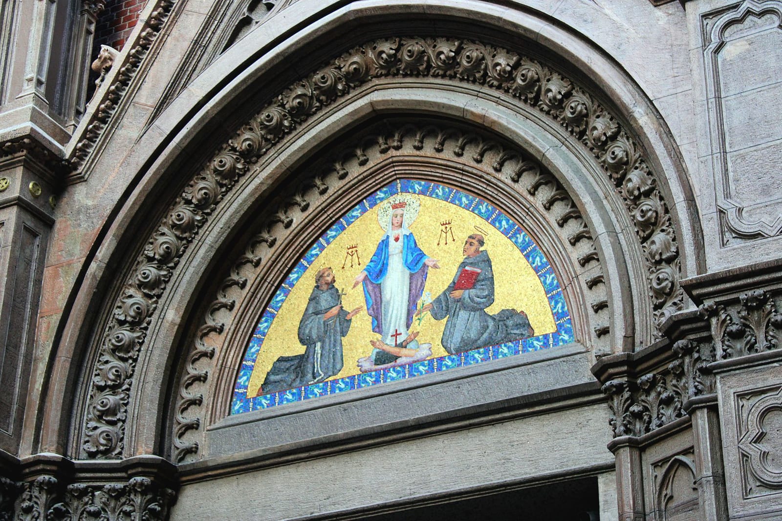 Ornate entrance portal and mosaic artwork at Saint Anthony of Padua Church in Istanbul.