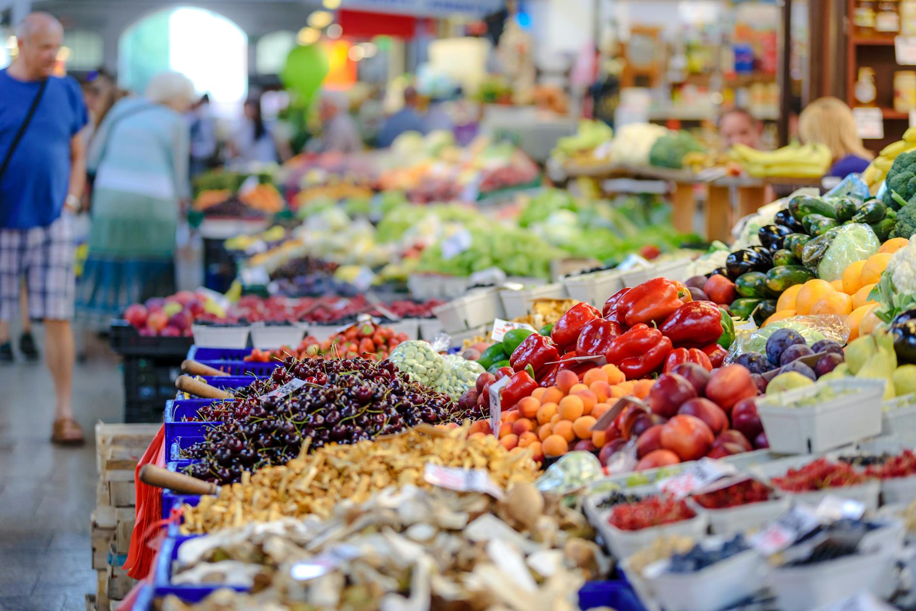 A beautiful and colorful display of fresh fruits and vegetables at a local organic market.