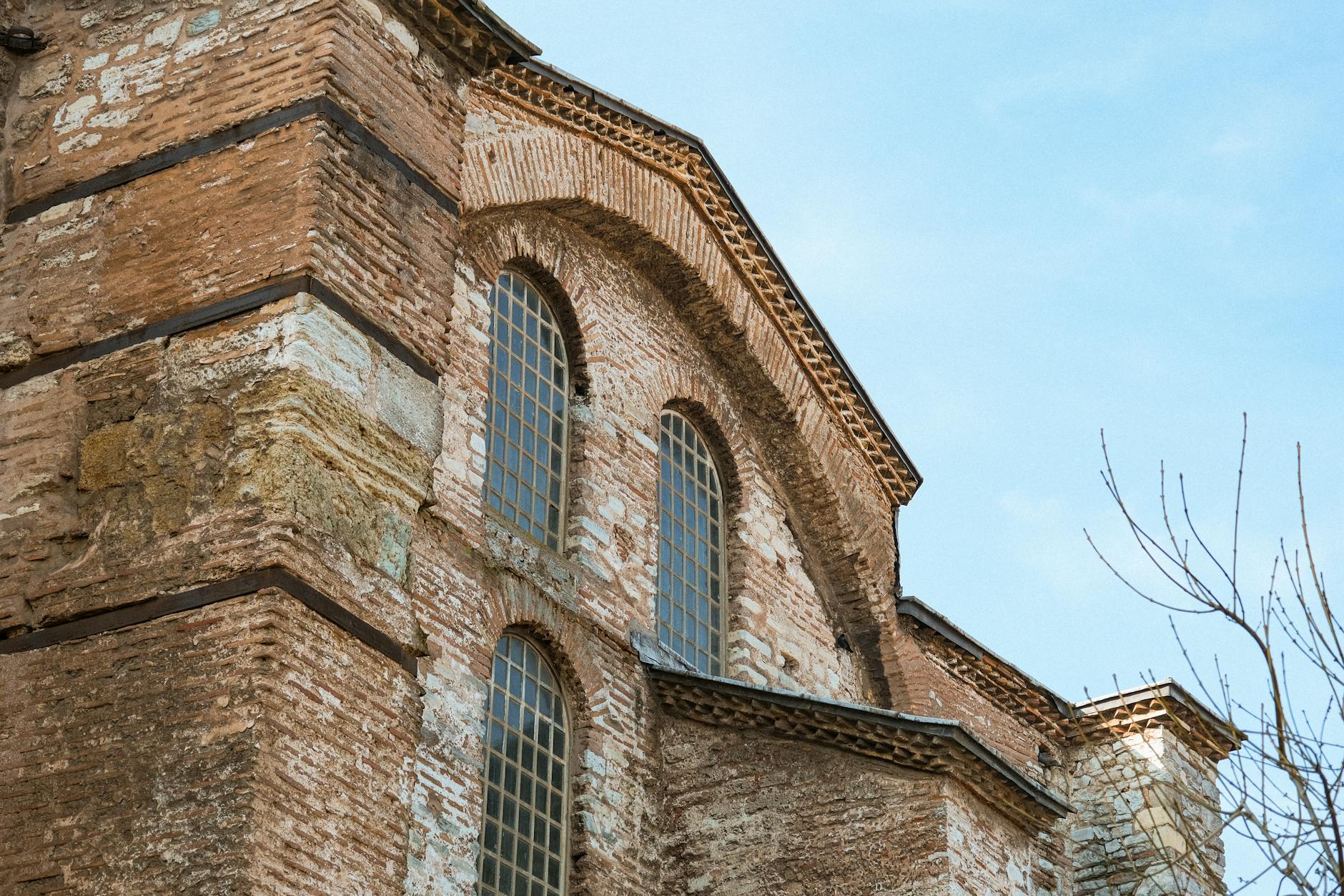 Detailed view of the historic Byzantine brickwork and arched windows of Hagia Irene.