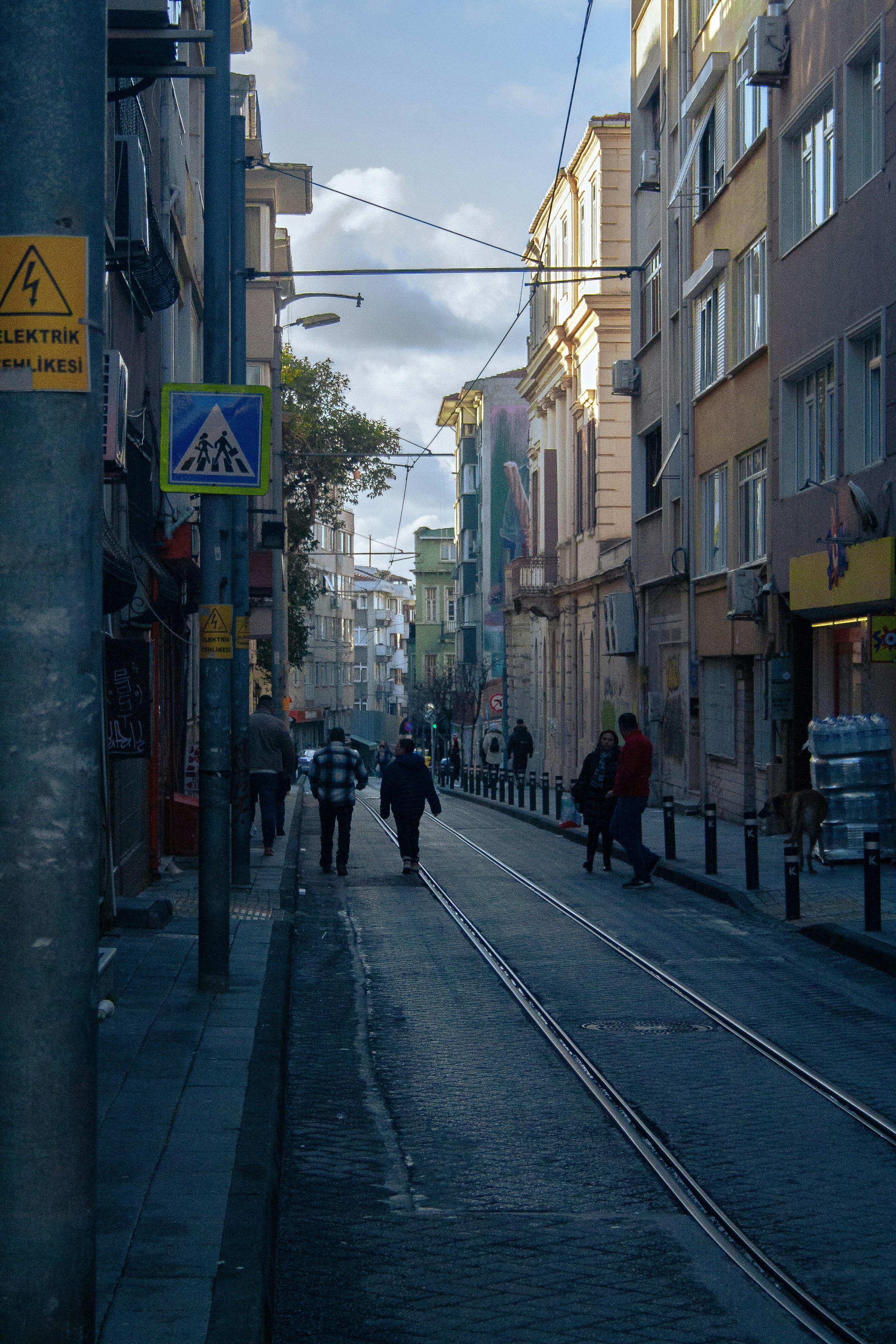 A bustling street market in Kadıköy on Istanbul's Asian side with fresh produce stalls and locals shopping.