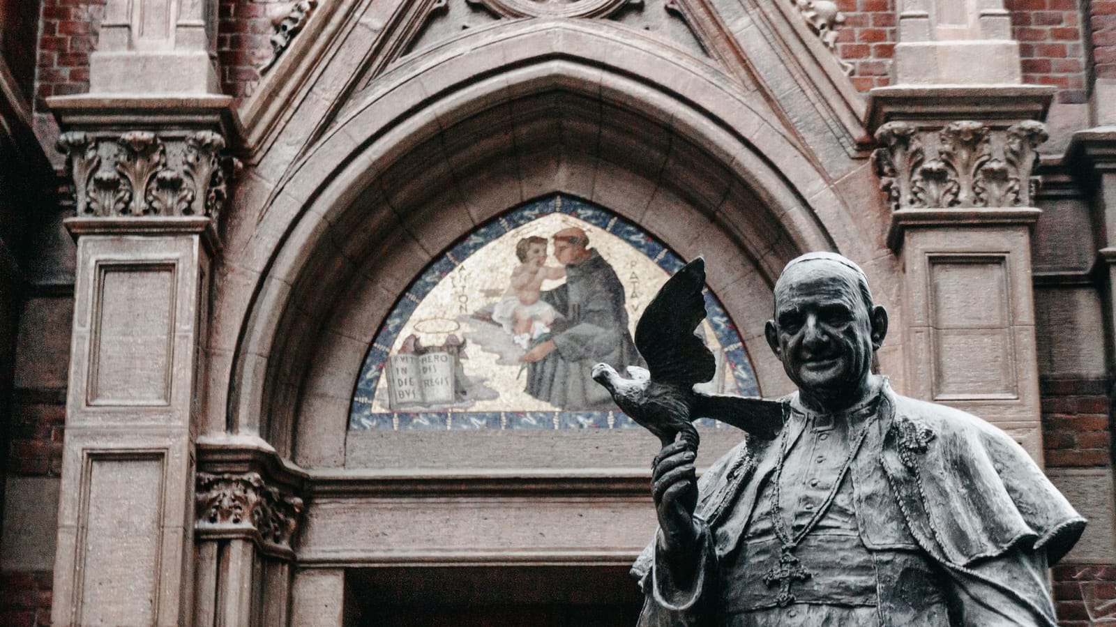 Bronze statue of Pope John XXIII before the portal of Saint Anthony Church in Istanbul.