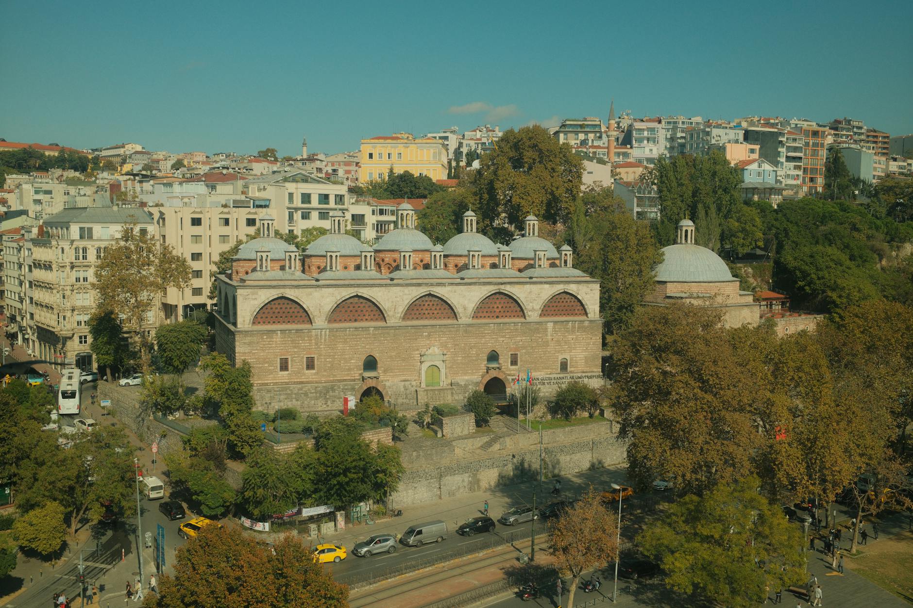 An aerial view of the historic Tophane-i Amire building and surrounding streets.